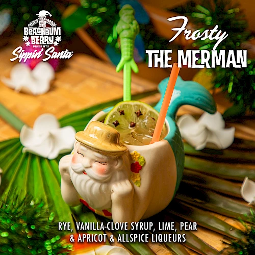 A festive drink called "Frosty the Merman" in a Santa mug with colorful stirrers. Ingredients: rye, syrups, lime, pear, apricot, and liqueurs.