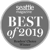 The image shows a gray circular badge reading "Seattle Magazine Best of 2019 Readers' Choice Winner."