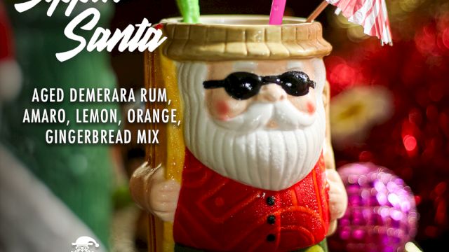 A cocktail menu featuring "Sippin’ Santa" with aged Demerara rum, amaro, lemon, orange, and gingerbread mix in a Santa-themed mug.