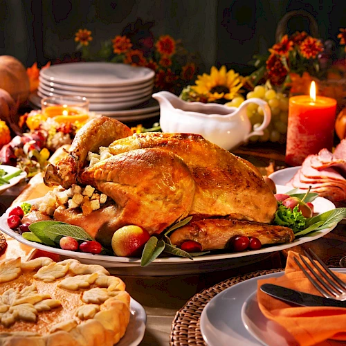 A festive Thanksgiving spread with a roast turkey, pie, vegetables, and wine, surrounded by autumn decorations like pumpkins and candles.